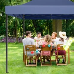 LifeGoods Partytent - 3x4.5 M - Zijwanden - Easy Up - Opvouwbaar - Waterdicht - Draagtas Met Wieltjes - Donkerblauw 20 LifeGoods Partytent - 3x4.5 M - Zijwanden - Easy Up - Opvouwbaar - Waterdicht - Draagtas Met Wieltjes - Donkerblauw -Tuinmeubelen Winkel 1200x1200 948